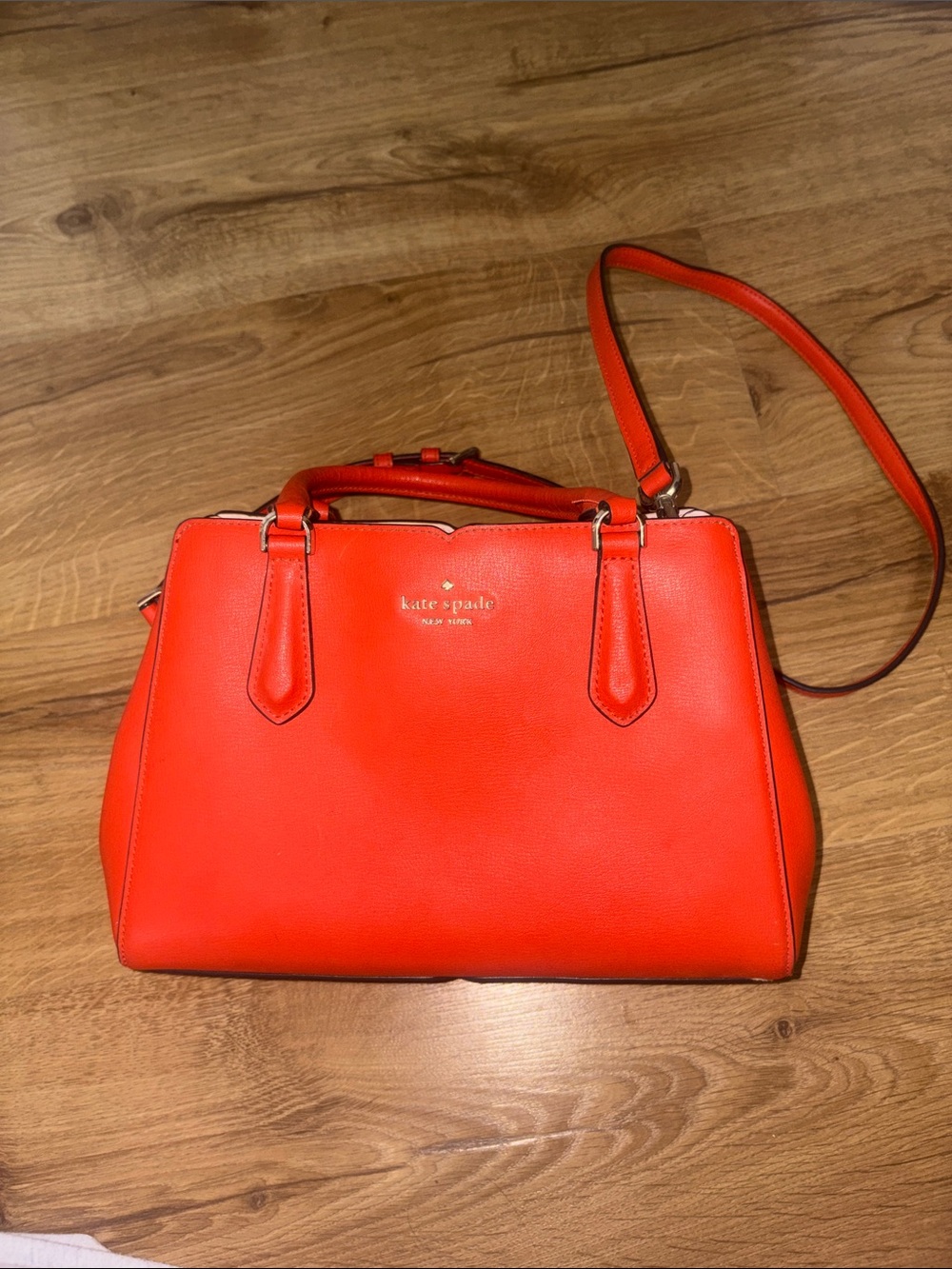 Bright red Kate spade bag